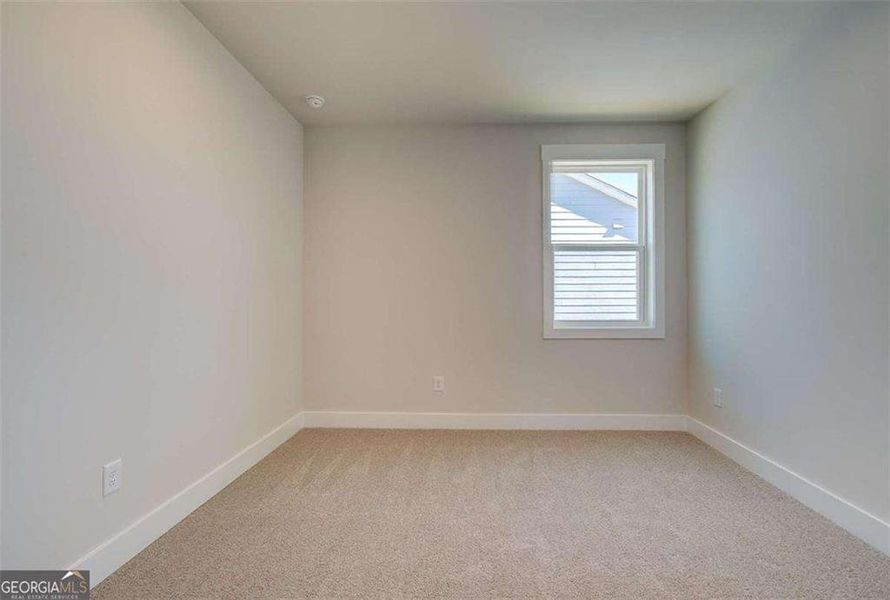 Spacious, unfurnished interior of a new home in The Paddocks at Doc Hughes, Buford (Image 30).