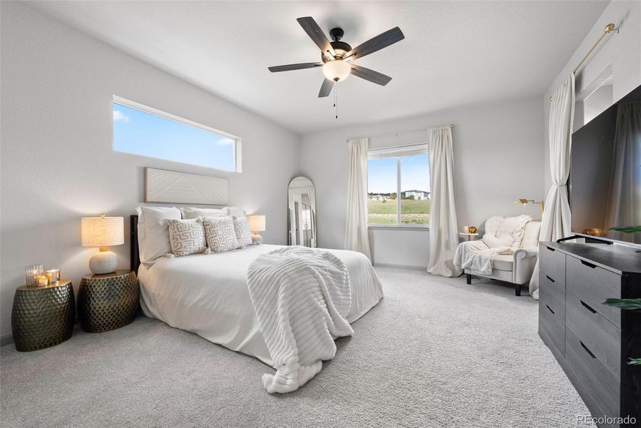 Simply lovely primary bedroom with luxurious ensuite bath, spaciuos walk-in closet.