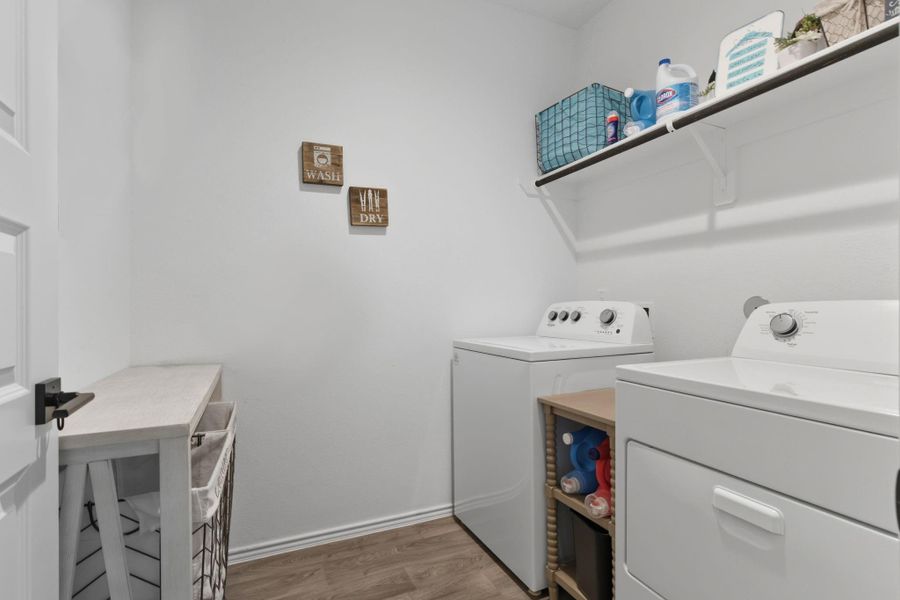 Convenient laundry room designed for efficiency and easy household organization. Convenient laundry room designed for efficiency and easy household organization.