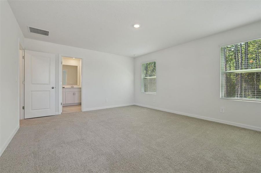 Spacious, unfurnished interior of a new home in Bradford Park, Ormond Beach (Image 29).