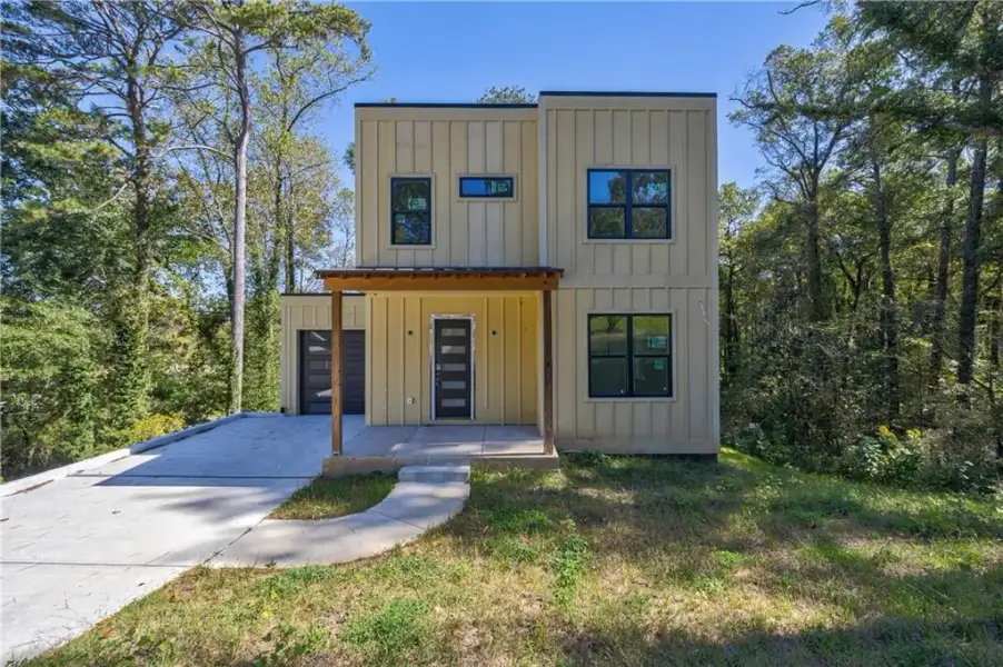 Front exterior of a new home in , Hapeville, GA, highlighting curb appeal (Image 6).