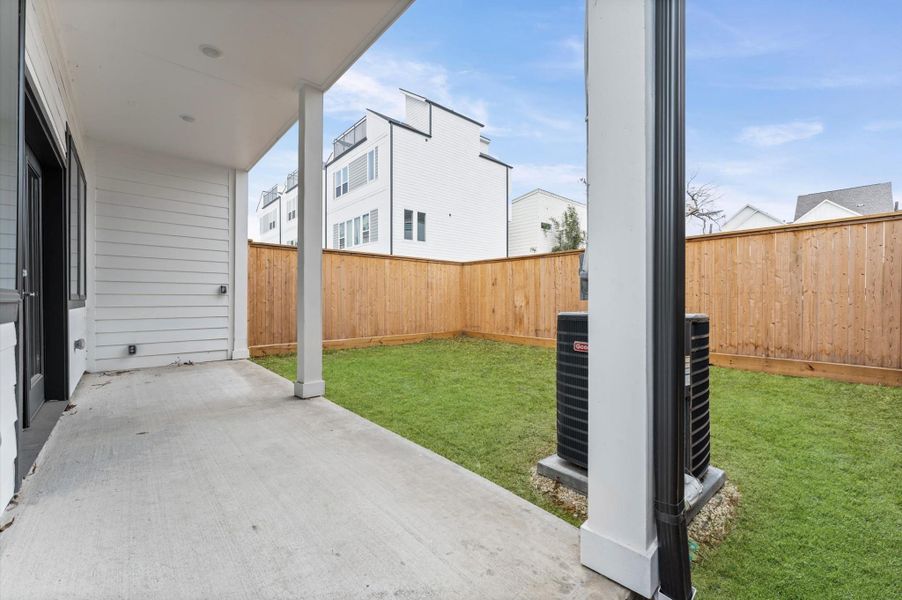 Exterior details and patio area of a home in , Houston (Image 2). Exterior details and patio area of a home in , Houston (Image 2).