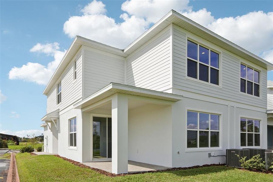 Front exterior of a new home in Isla Mirada, San Antonio, FL, highlighting curb appeal (Image 23).