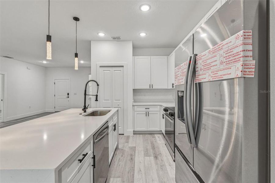 Furnished interior view inside a new home in , North Port (Image 11).