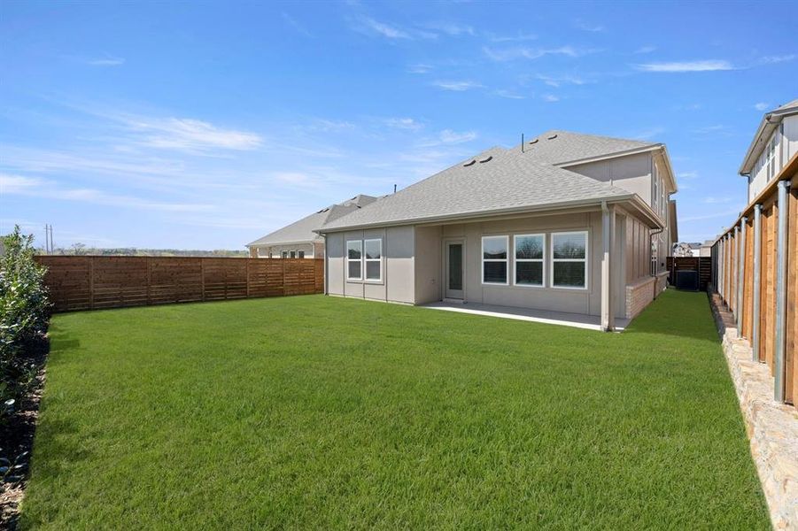 Exterior details and patio area of a home in Solterra, Mesquite (Image 19).