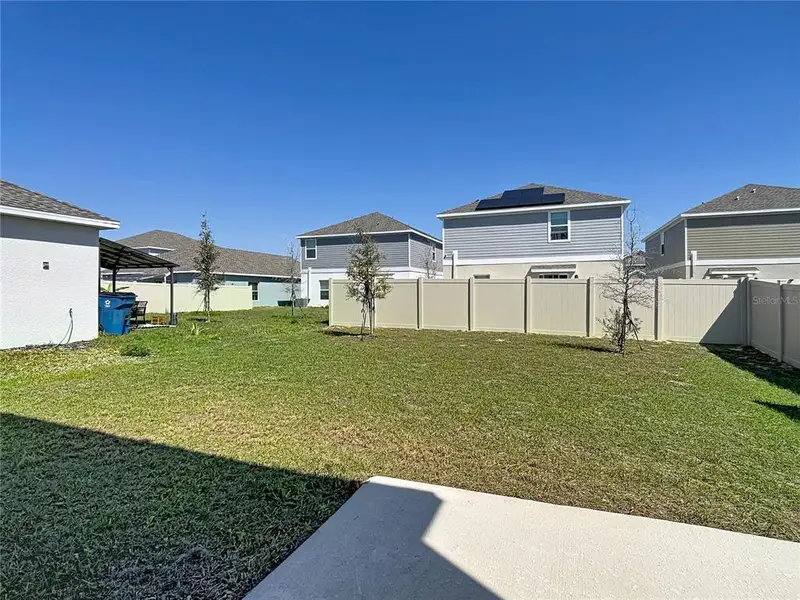 Exterior details and patio area of a home in Lawson Dunes, Haines City (Image 3).