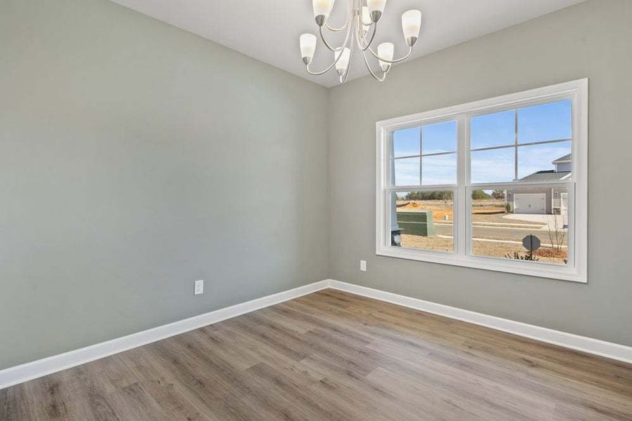 Representative unfurnished interior of a home built from the Camellia by Caviness & Cates Communities in Bartlett Manor, Youngsville (Image 38).