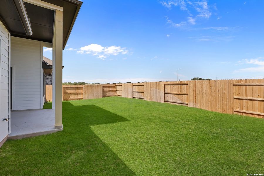Exterior details and patio area of a home in Buffalo Crossing, Cibolo (Image 29).