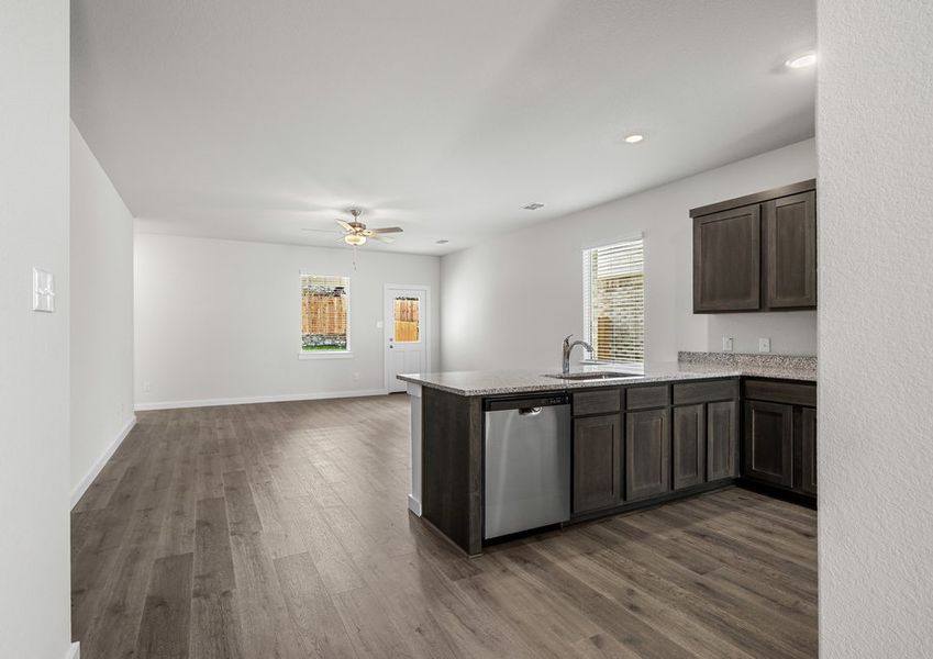 The living room sits right off of the kitchen.