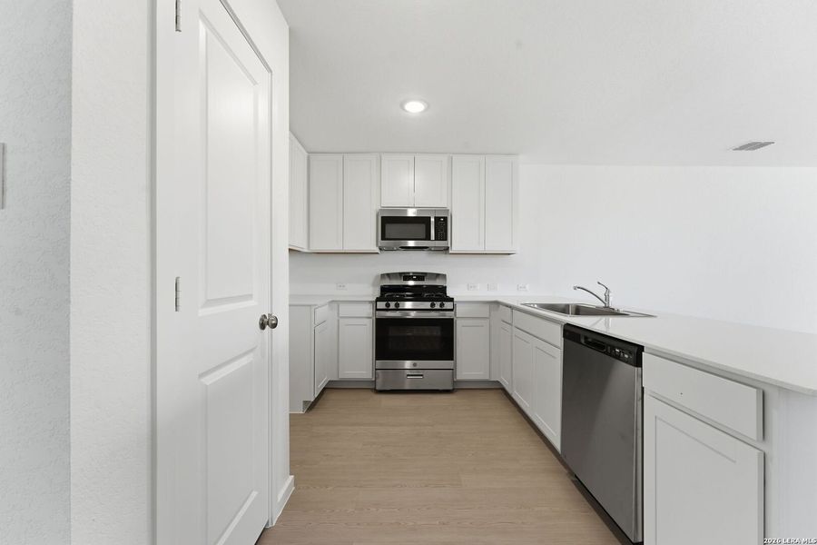 Furnished interior view inside a new home in Randolph Crossing, Converse (Image 7). Furnished interior view inside a new home in Randolph Crossing, Converse (Image 7).
