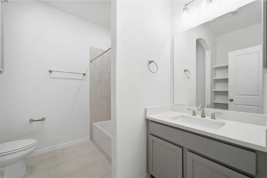 Full bathroom with vanity and bathing tub / shower combination
