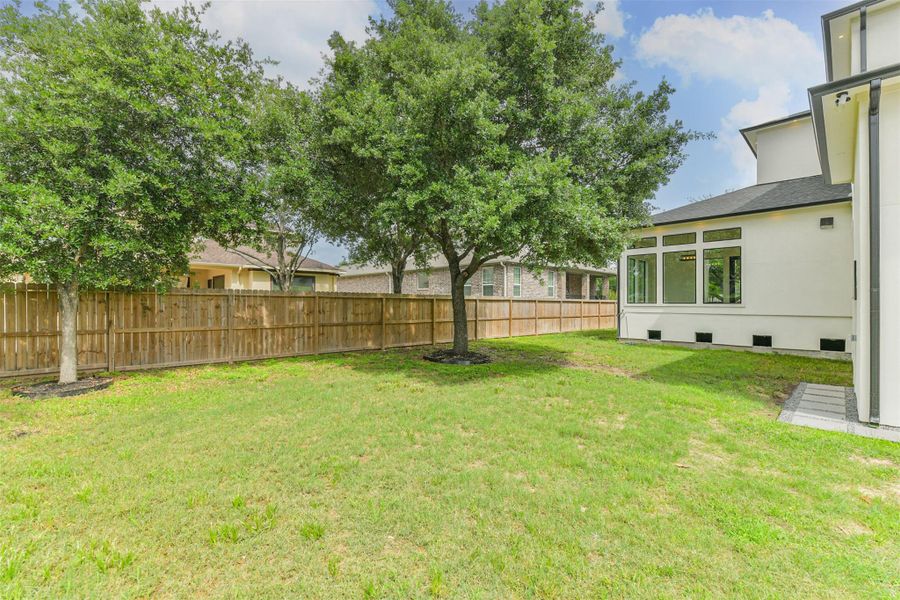 Exterior details and patio area of a home in , Spring (Image 24).