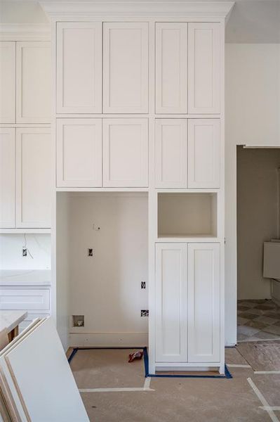 Ample custom cabinetry in your stunning kitchen.