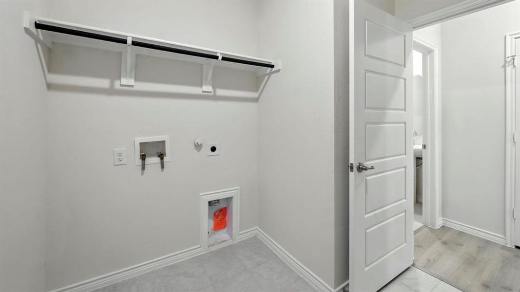 Laundry room featuring washer hookup and hookup for a gas dryer