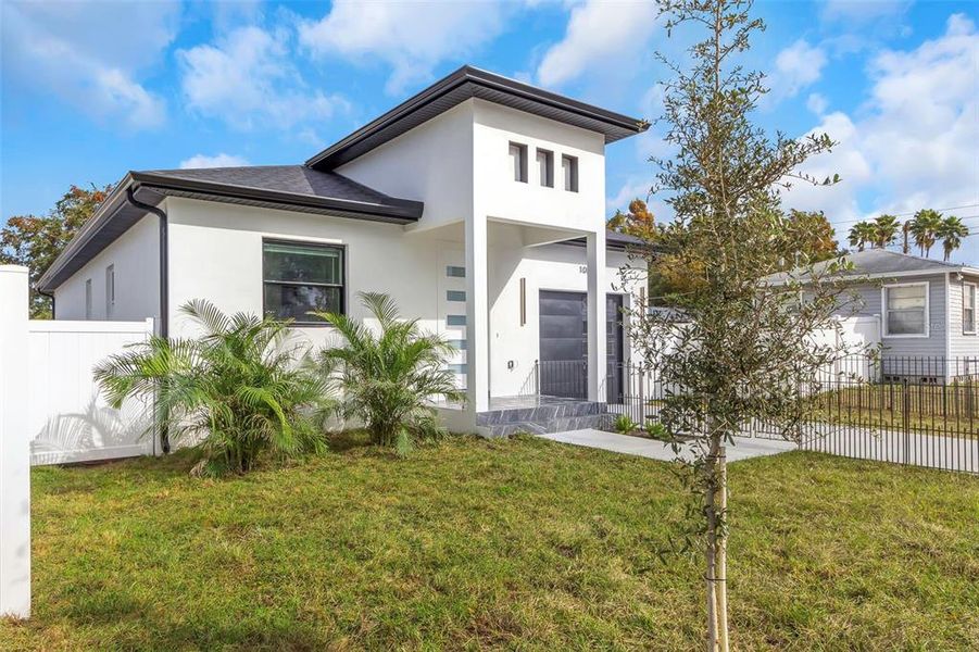 Front exterior of a new home in , Clearwater, FL, highlighting curb appeal (Image 22).
