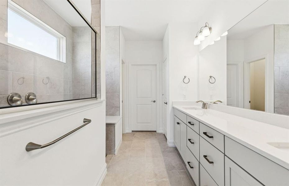 Owner's bath with spa shower and double vanity Owner's bath with spa shower and double vanity