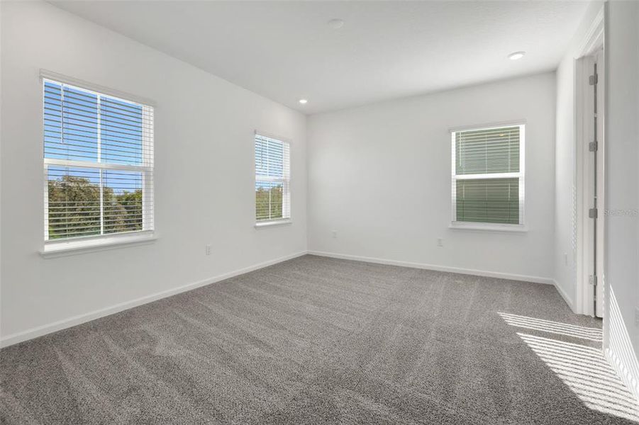 Spacious, unfurnished interior of a new home in Serenade at Ovation, Winter Garden (Image 33). Spacious, unfurnished interior of a new home in Serenade at Ovation, Winter Garden (Image 33).