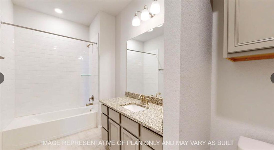 Bathroom with toilet, shower / washtub combination, and vanity Bathroom with toilet, shower / washtub combination, and vanity