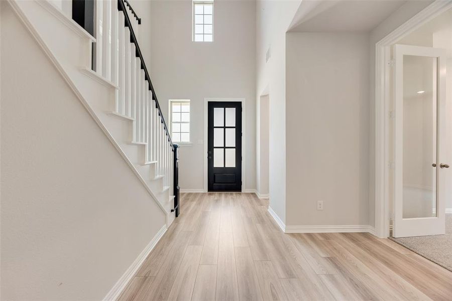 Spacious, unfurnished interior of a new home in Valencia On The Lake, Little Elm (Image 16).
