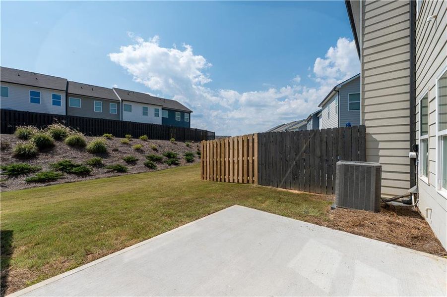 Front exterior of a new home in , Hoschton, GA, highlighting curb appeal (Image 19).