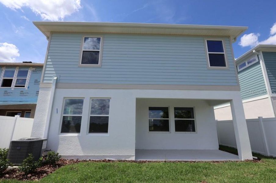 Exterior details and patio area of a home in Persimmon Place – Garden Series, Wesley Chapel (Image 2). Exterior details and patio area of a home in Persimmon Place – Garden Series, Wesley Chapel (Image 2).