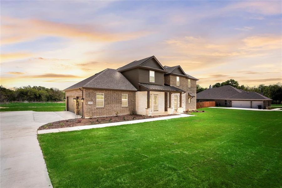 Front exterior of a new home in Crystal Springs Estates, Alvarado, TX, highlighting curb appeal (Image 27).