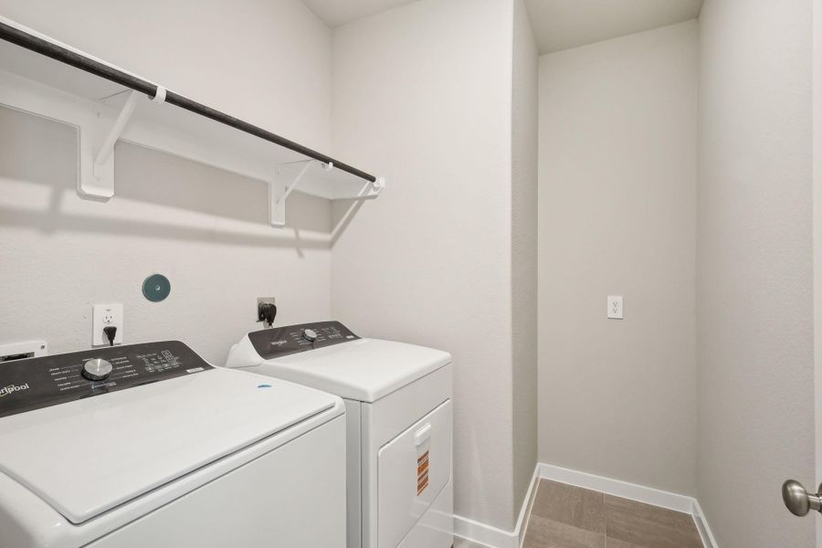 Furnished interior view inside a new home in Massey Oaks - Premier Series, Pearland (Image 5).