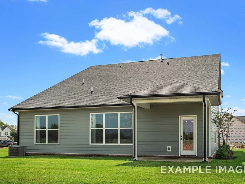 Exterior details and patio area of a home in Woods Crossing, Gallatin (Image 3).