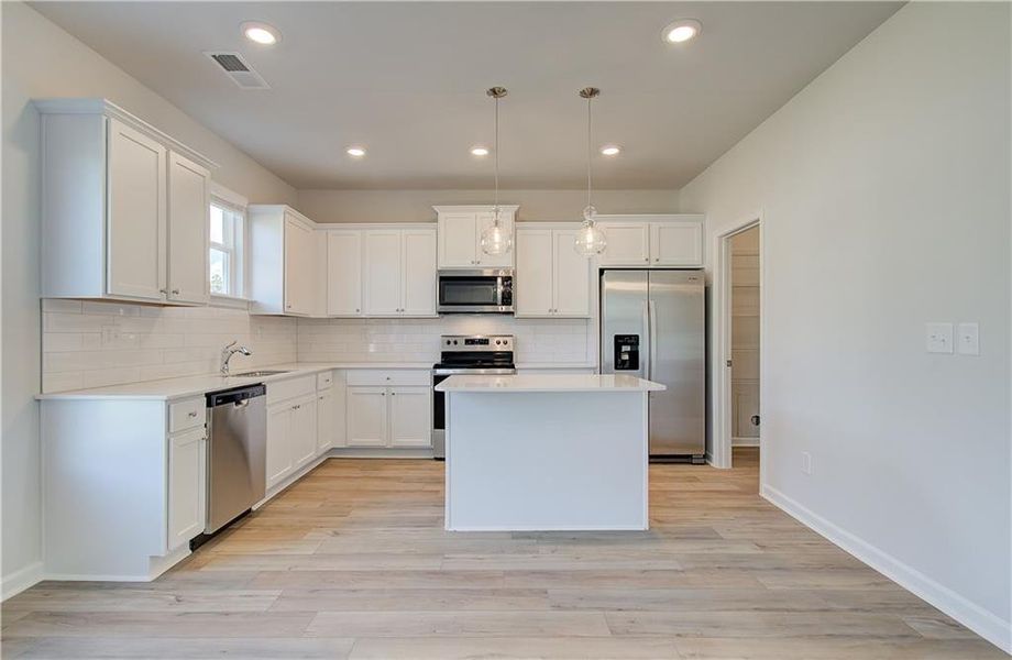 Furnished interior view inside a new home in Westminster, Covington (Image 7). Furnished interior view inside a new home in Westminster, Covington (Image 7).