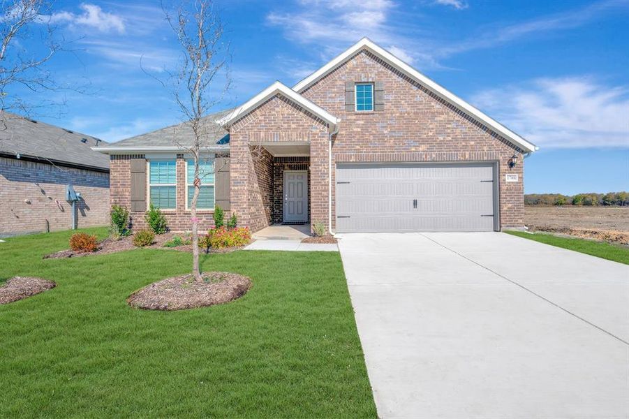 Front exterior of a new home in Verandah, Royse City, TX, highlighting curb appeal (Image 1).