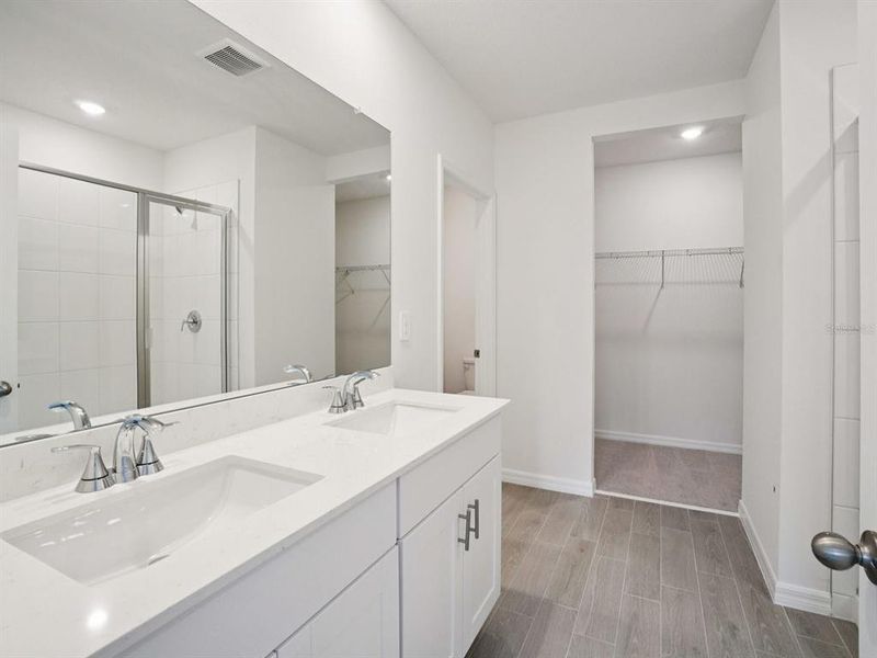 Furnished interior view inside a new home in The Grove at Stuart Crossing - Classic Series, Bartow (Image 6). Furnished interior view inside a new home in The Grove at Stuart Crossing - Classic Series, Bartow (Image 6).