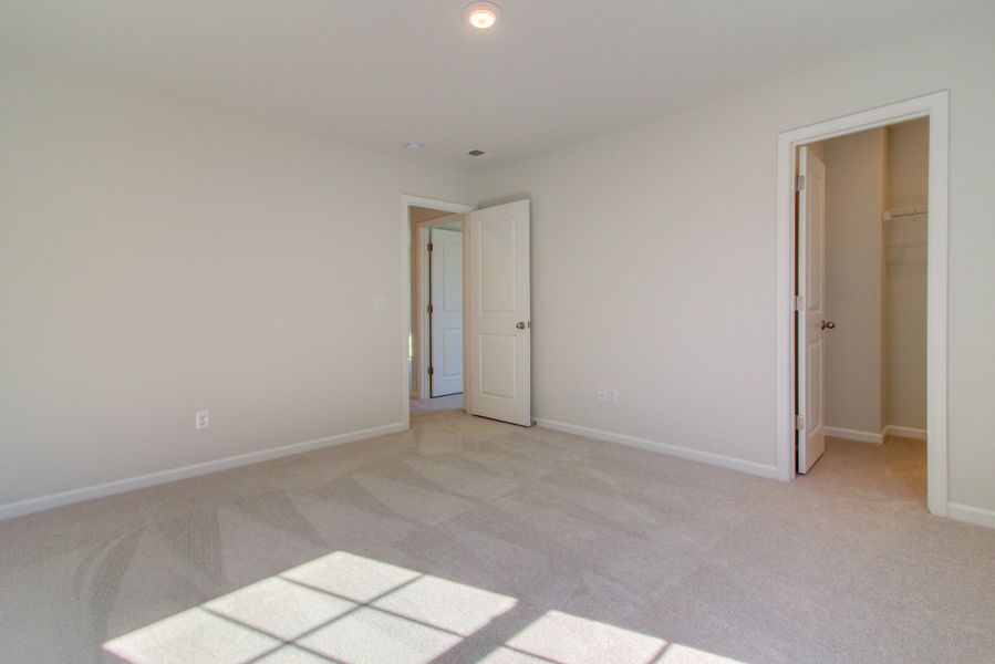 Spacious, unfurnished interior of a new home in Cypress Preserve: Arbor Collection, Moncks Corner (Image 8). Spacious, unfurnished interior of a new home in Cypress Preserve: Arbor Collection, Moncks Corner (Image 8).