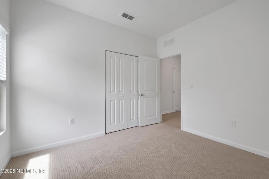 Spacious, unfurnished interior of a new home in Cordova Palms, St. Augustine (Image 19).