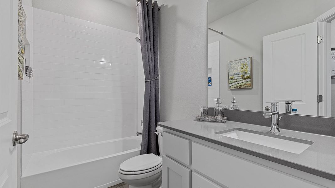 Representative furnished interior of a home built from the Valley spring by D.R. Horton in Lakeview Pointe, Grand Prairie (Image 27).