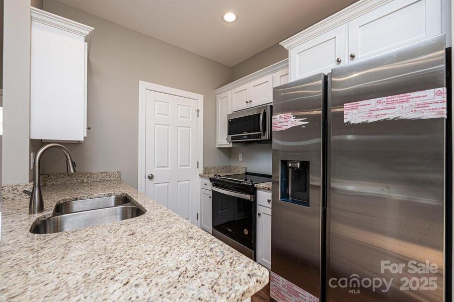 Furnished interior view inside a new home in , Hickory (Image 3).