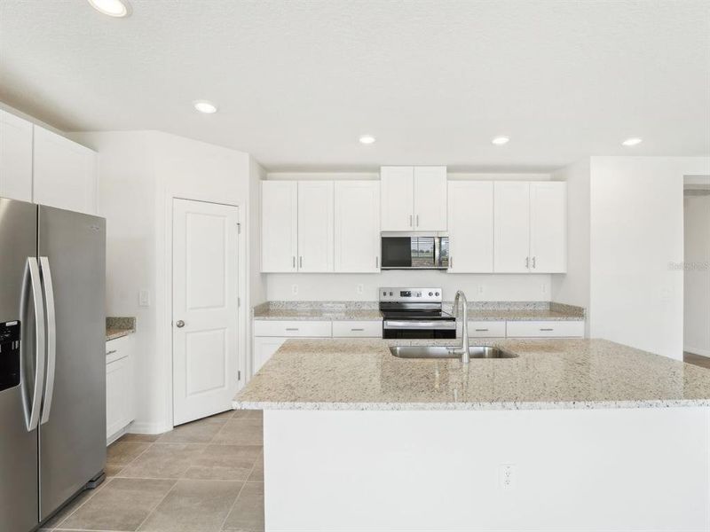 Furnished interior view inside a new home in Benton Hills - Classic Series, Brooksville (Image 11).