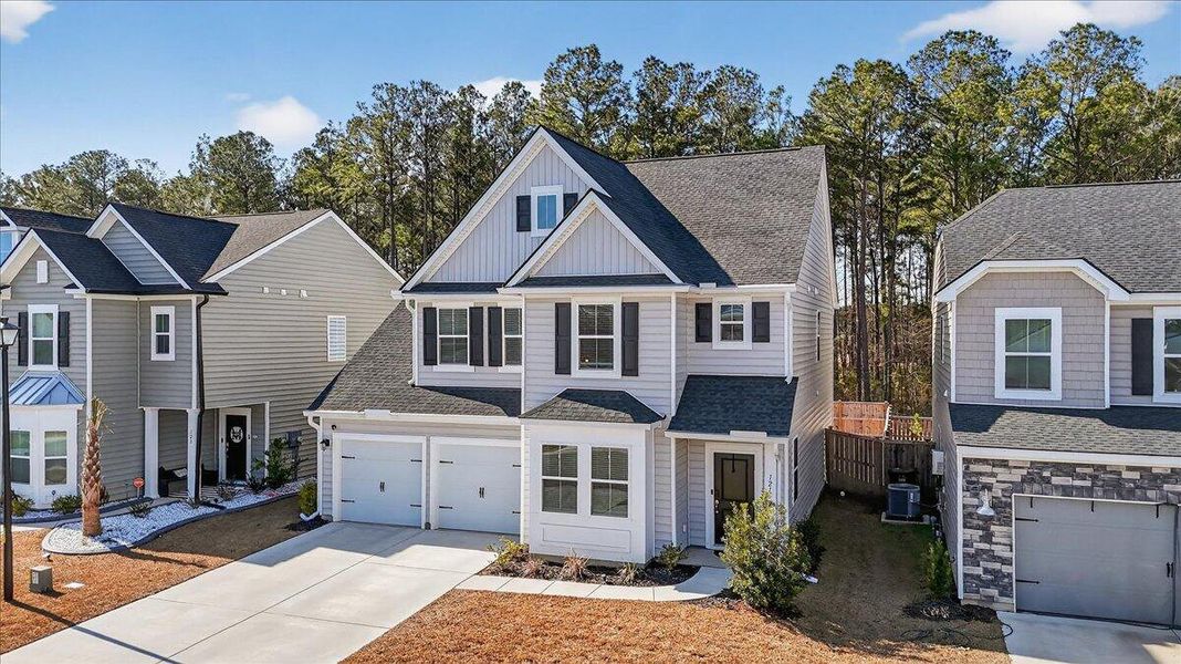 Front exterior of a new home in Cypress Preserve, Moncks Corner, SC, highlighting curb appeal (Image 22). Front exterior of a new home in Cypress Preserve, Moncks Corner, SC, highlighting curb appeal (Image 22).