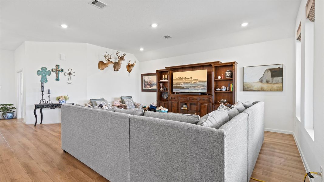 Spacious and inviting, this family room offers endless possibilities for comfortable living, effortless entertaining, and personalization to complement your lifestyle. Spacious and inviting, this family room offers endless possibilities for comfortable living, effortless entertaining, and personalization to complement your lifestyle.