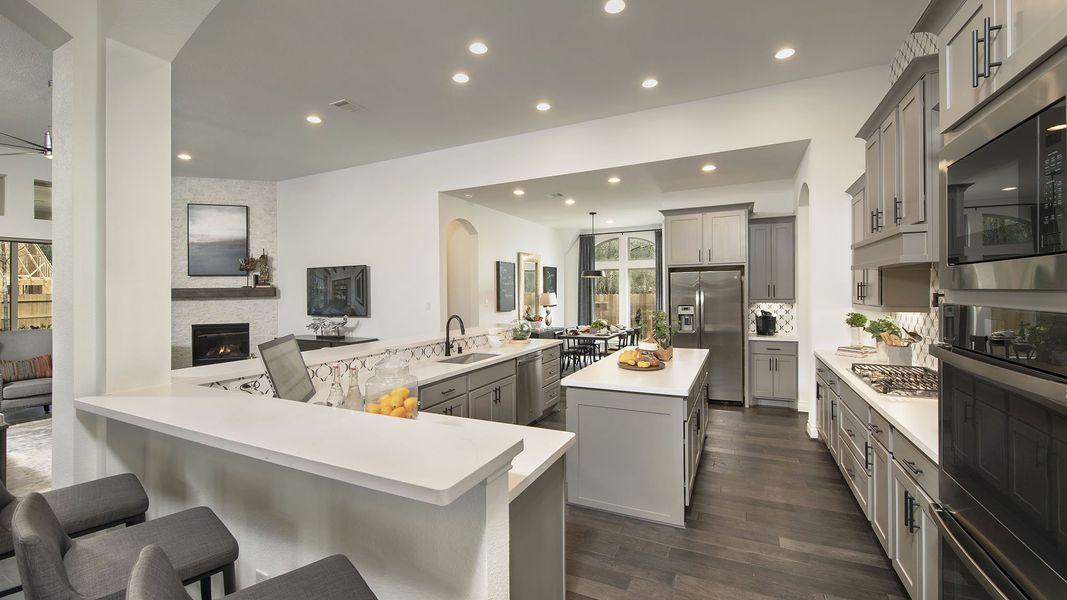Representative furnished interior of a home built from the 3578W by Perry Homes in Lakes of Cane Island, Katy (Image 27).