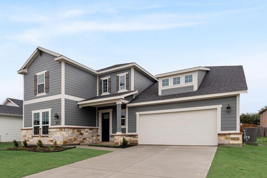 Front exterior of a new home in Creekside of Crowley, Crowley, TX, highlighting curb appeal (Image 2). Front exterior of a new home in Creekside of Crowley, Crowley, TX, highlighting curb appeal (Image 2).