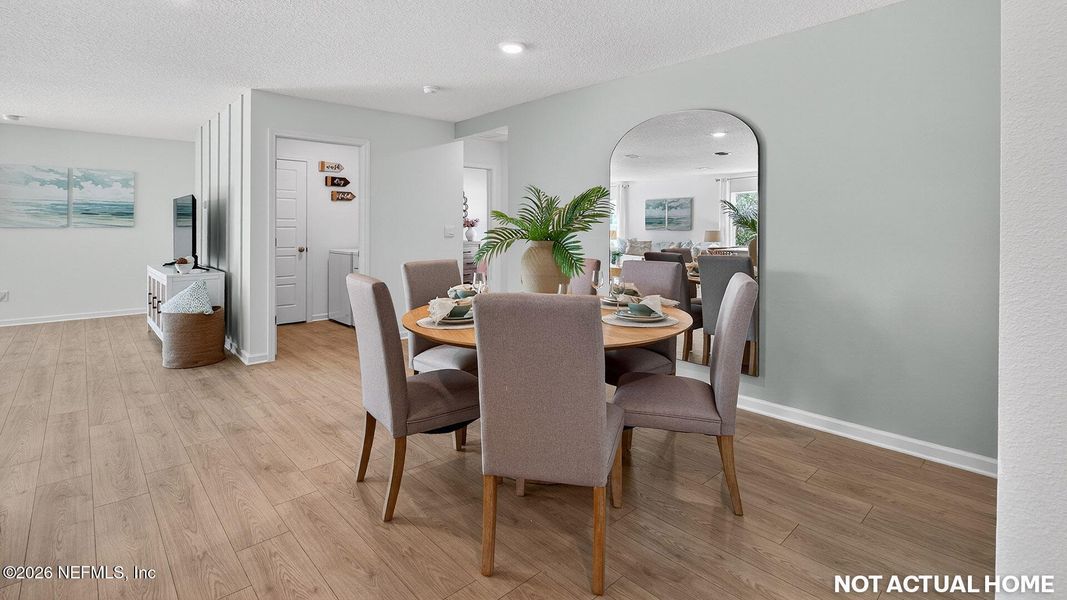 Furnished interior view inside a new home in Sawmill Branch, Palm Coast (Image 6).