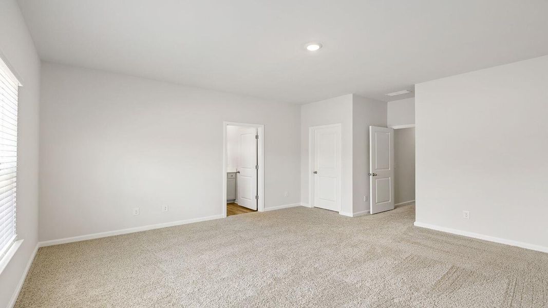 Spacious, unfurnished interior of a new home in The Crossing at St. James, Summerville (Image 16).