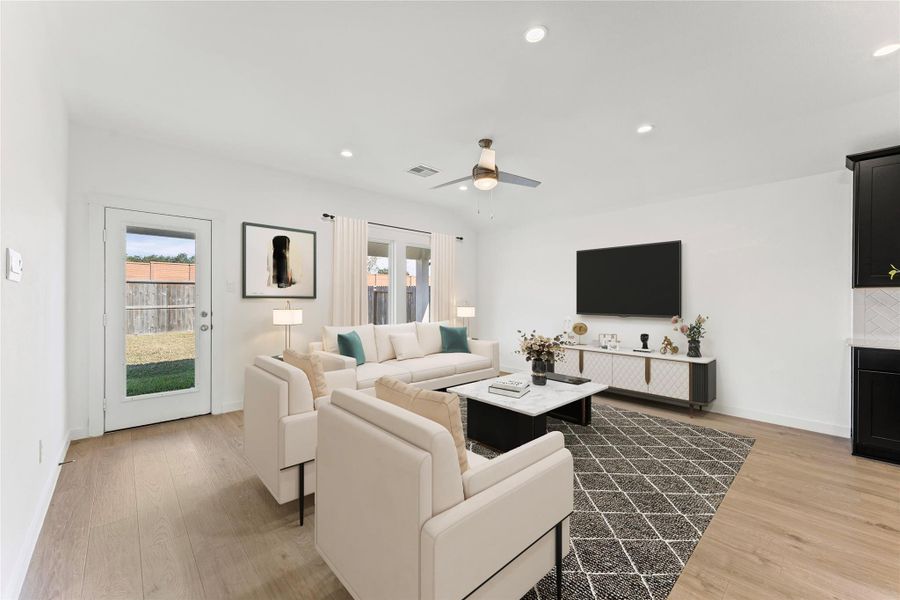 It offers the perfect layout for hosting large dinner parties or enjoying cozy movie nights with the entire family.