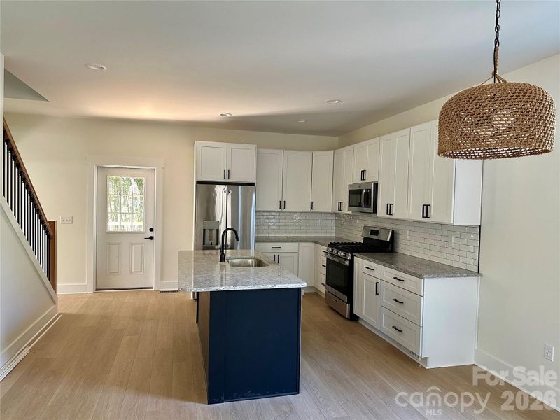 Furnished interior view inside a new home in , Asheville (Image 3).