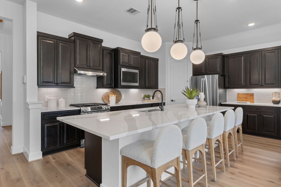 Furnished interior view inside a new home in The Highlands, Porter (Image 4).
