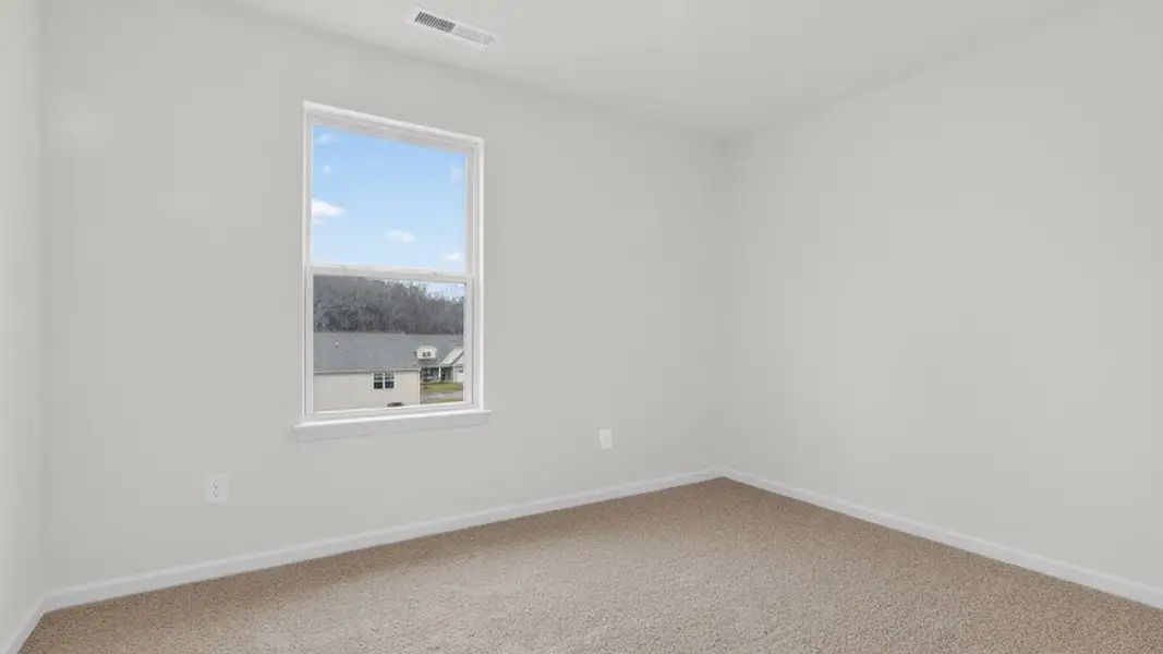 Spacious, unfurnished interior of a new home in Mangum Farms, Stem (Image 22). Spacious, unfurnished interior of a new home in Mangum Farms, Stem (Image 22).