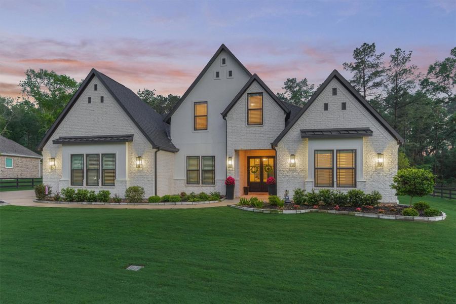 Front exterior of a new home in , Montgomery, TX, highlighting curb appeal (Image 22).