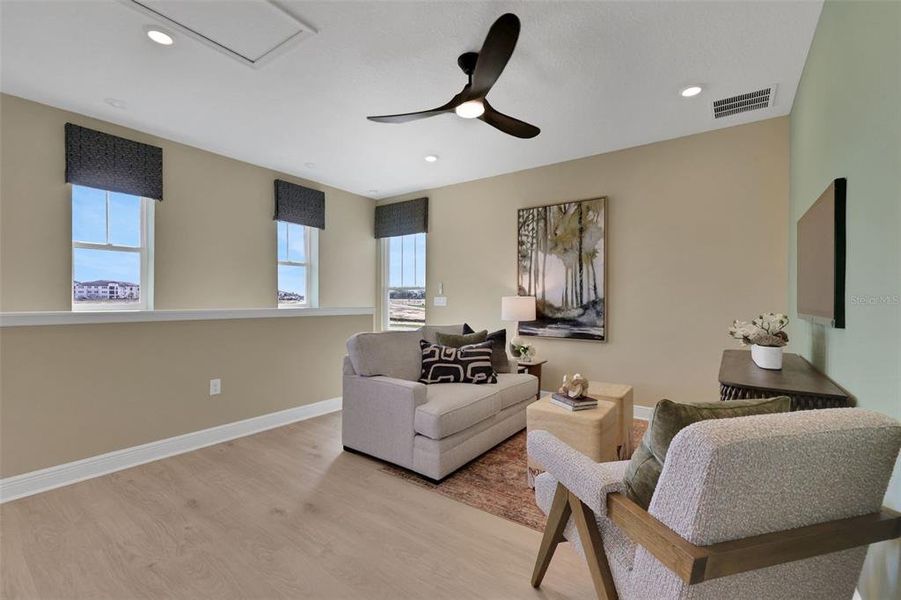 Furnished interior view inside a new home in Crossroads at Kelly Park, Apopka (Image 16).