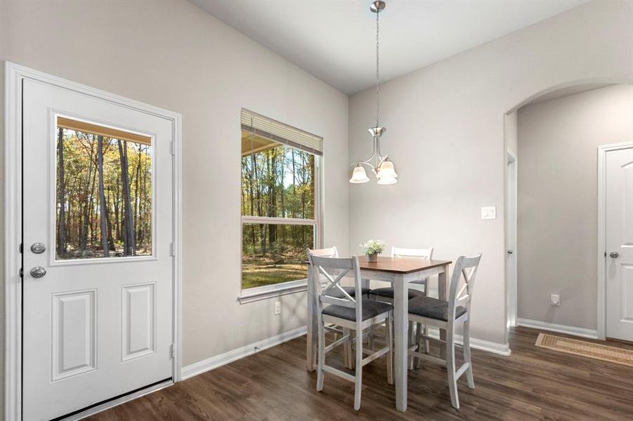 Breakfast area overlooking the trees in the backyard!