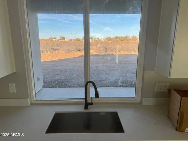 28304 Large sink showing views out kitch